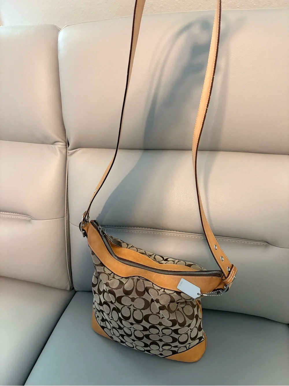 Coach Signature Canvas Shoulder Bag/Crossbody Hobo bag in Brown and Tan